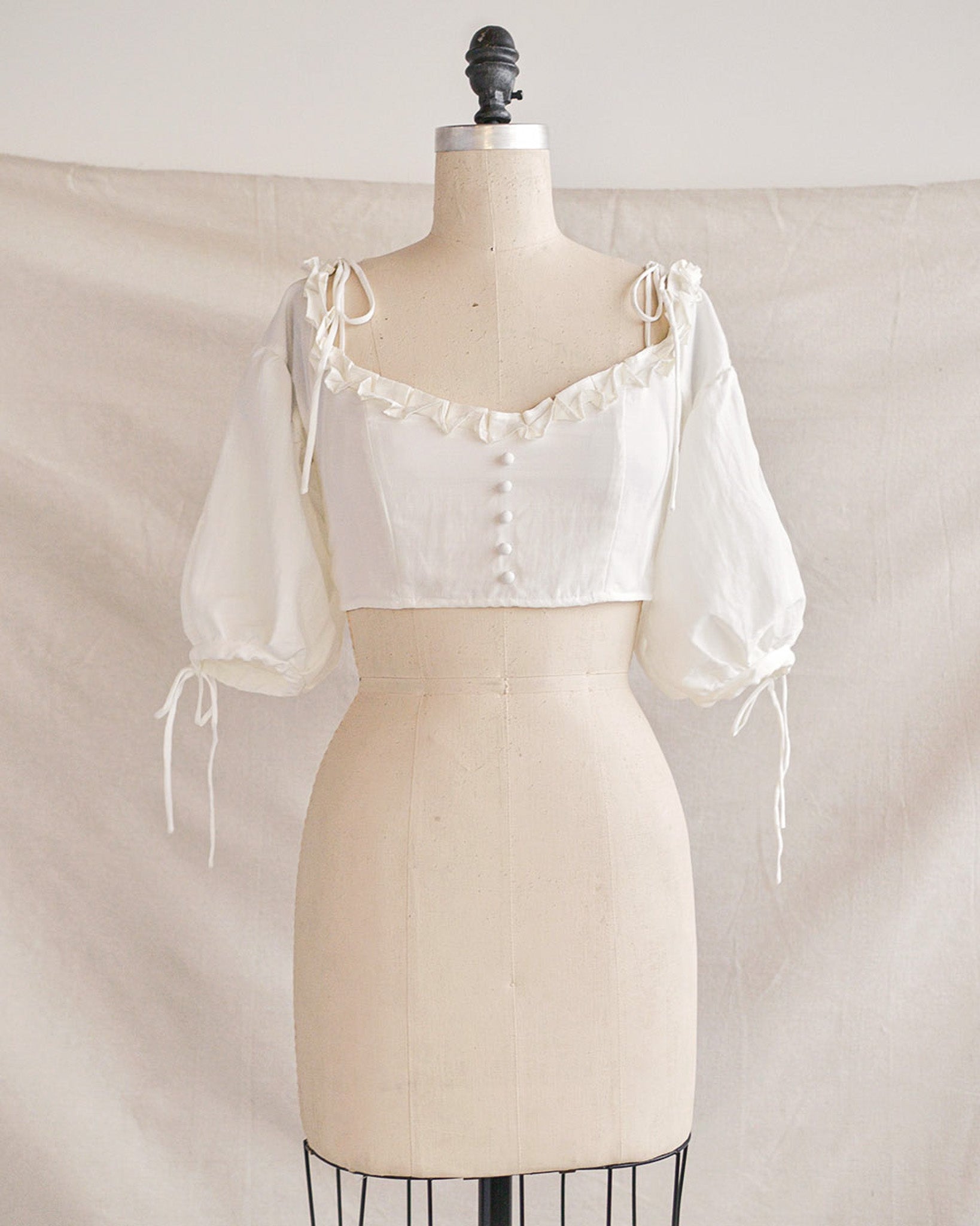 Romantic-vintage-inspired-white-solid-off-shoulder-crop-top-C1622T_1_1638x.jpg?v\u003d1698863481